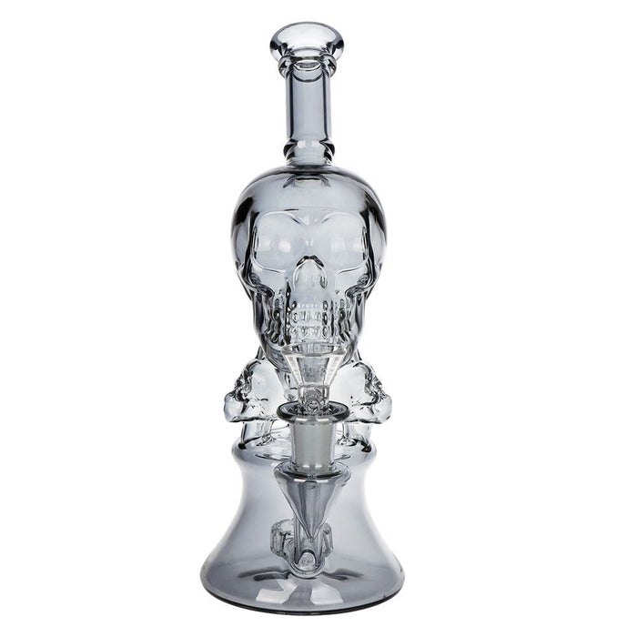 Clear glass skull-shaped water pipe on a white background